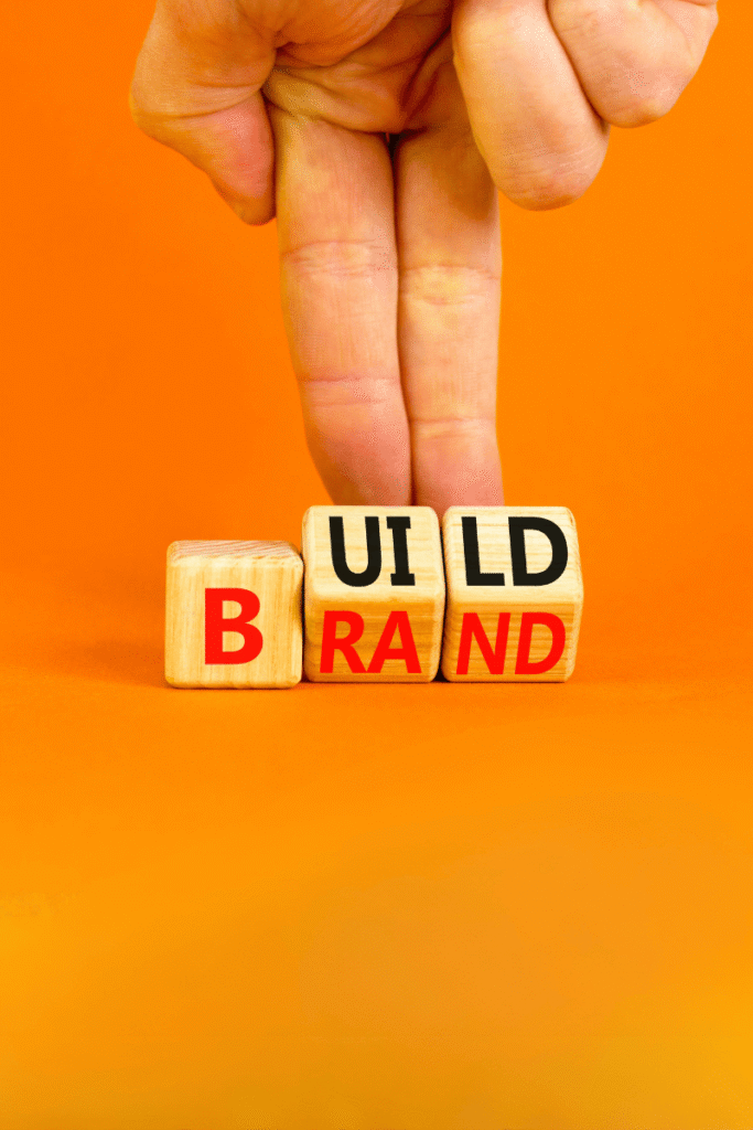 Wooden blocks spelling Build Brand